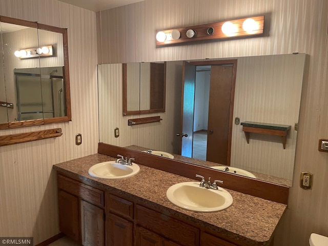 2169 78th Ct E, Inver Grove Heights, MN 55077 - full bath featuring wallpapered walls and double vanity
