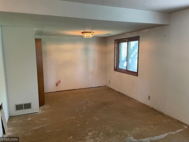 2169 78th Ct E, Inver Grove Heights, MN 55077 - spare room featuring a textured ceiling