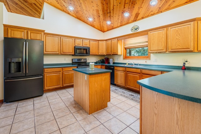 W5136 Hale Ct, Farmington Twp, WI 54636 - kitchen with black appliances, wood ceiling, a kitchen island, dark countertops, and light tile patterned flooring