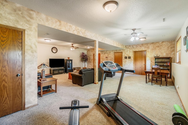 W5136 Hale Ct, Farmington Twp, WI 54636 - exercise room featuring a ceiling fan, carpet flooring, a textured ceiling, and wallpapered walls