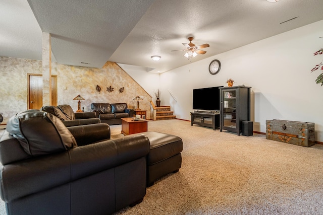 W5136 Hale Ct, Farmington Twp, WI 54636 - carpeted living room with stairs, a ceiling fan, and a textured ceiling