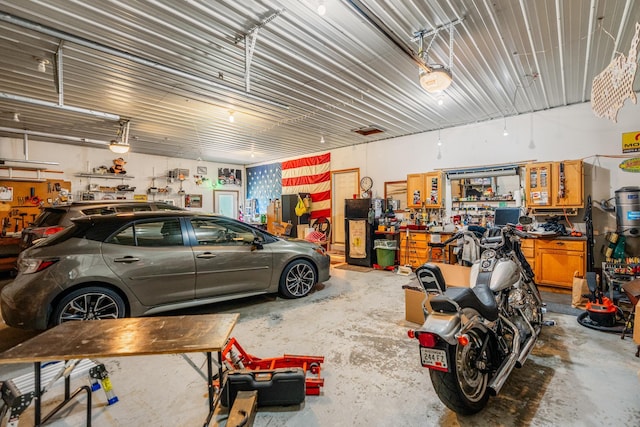 W5136 Hale Ct, Farmington Twp, WI 54636 - garage featuring a workshop area