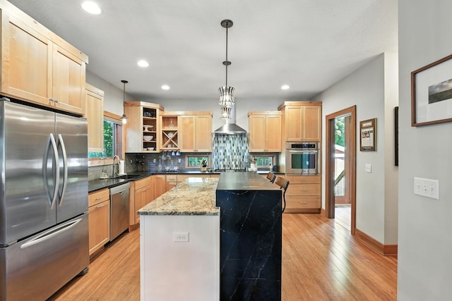 2794 Casco Point Rd, Orono, MN 55391 - kitchen featuring appliances with stainless steel finishes, light brown cabinetry, light wood-style floors, healthy amount of natural light, and recessed lighting