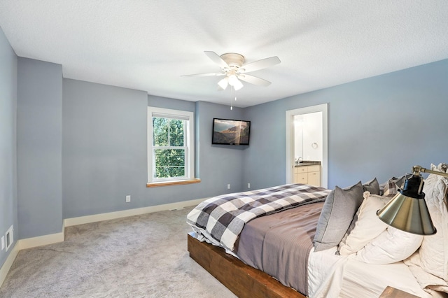 2794 Casco Point Rd, Orono, MN 55391 - bedroom with carpet flooring, ceiling fan, connected bathroom, and a textured ceiling
