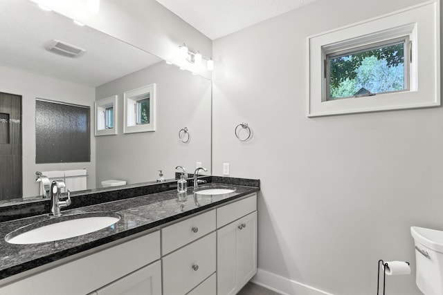 2794 Casco Point Rd, Orono, MN 55391 - full bathroom featuring toilet and double vanity
