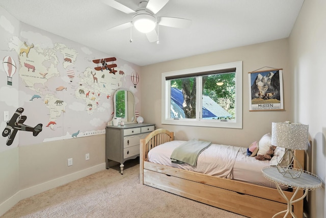 2794 Casco Point Rd, Orono, MN 55391 - carpeted bedroom with baseboards and a ceiling fan