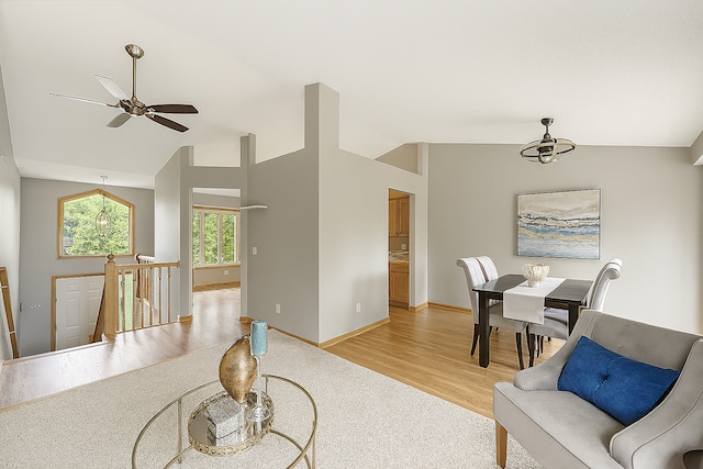 10374 61st St NE, Albertville, MN 55301 - living room featuring a ceiling fan, lofted ceiling, and light wood-style floors