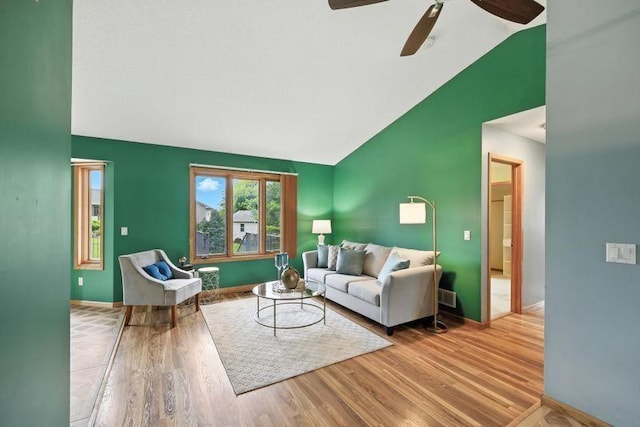 10374 61st St NE, Albertville, MN 55301 - living room featuring lofted ceiling, wood finished floors, and a ceiling fan