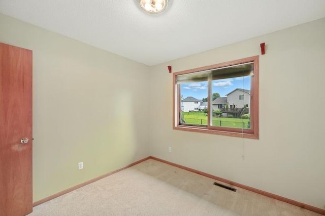 10374 61st St NE, Albertville, MN 55301 - carpeted empty room with baseboards