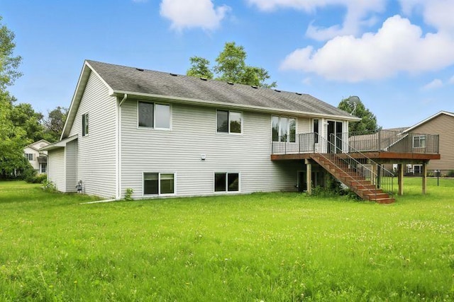 10374 61st St NE, Albertville, MN 55301 - rear view of property featuring stairway, a lawn, a wooden deck, and a shingled roof