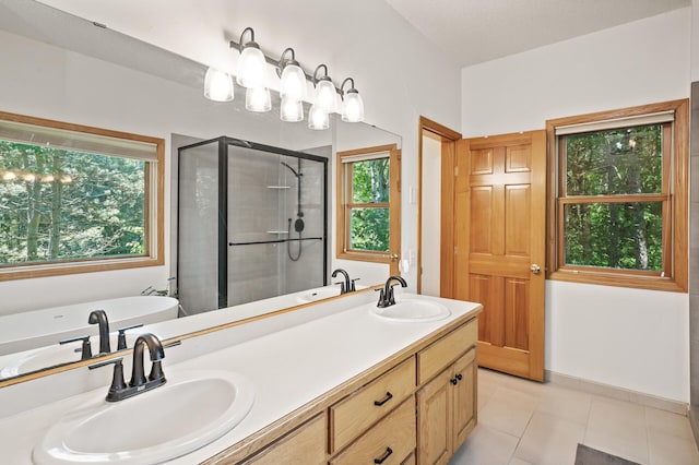 11691 115th St N, Grant, MN 55082 - bathroom with a stall shower, a soaking tub, double vanity, and tile patterned flooring