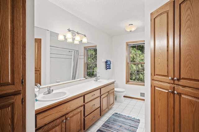 11691 115th St N, Grant, MN 55082 - full bathroom featuring double vanity, tile patterned flooring, a shower with curtain, and a textured ceiling