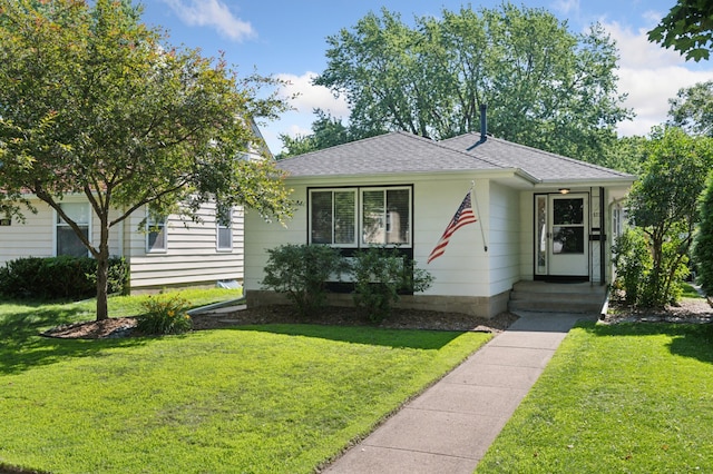 5737 20th Ave S, Minneapolis, MN 55417 - view of front of house with a front yard and roof with shingles