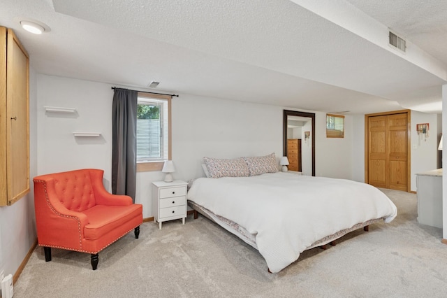 5737 20th Ave S, Minneapolis, MN 55417 - bedroom featuring light carpet and a textured ceiling