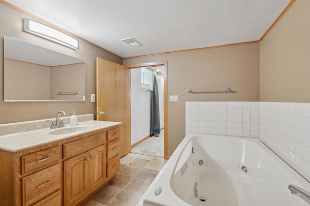 5737 20th Ave S, Minneapolis, MN 55417 - bathroom with a whirlpool tub, vanity, and ornamental molding