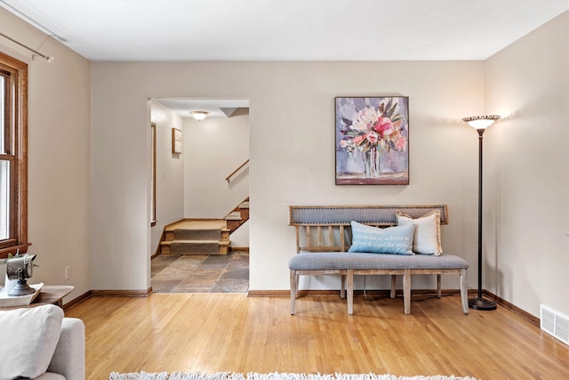 1762 Canyon Ln, New Brighton, MN 55112 - living area featuring wood finished floors and stairs