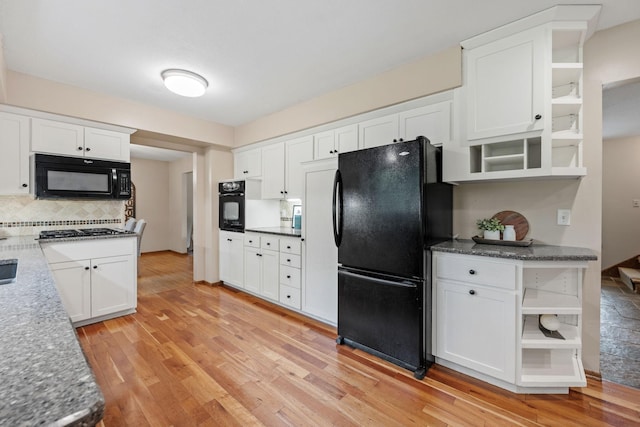 1762 Canyon Ln, New Brighton, MN 55112 - kitchen featuring open shelves, black appliances, and light wood-type flooring
