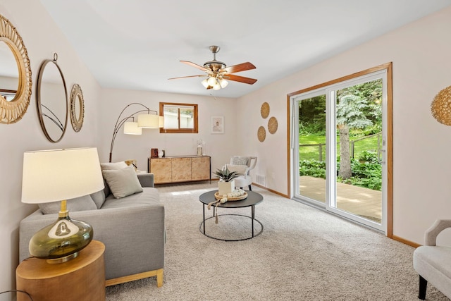 1762 Canyon Ln, New Brighton, MN 55112 - carpeted living area featuring healthy amount of natural light and ceiling fan