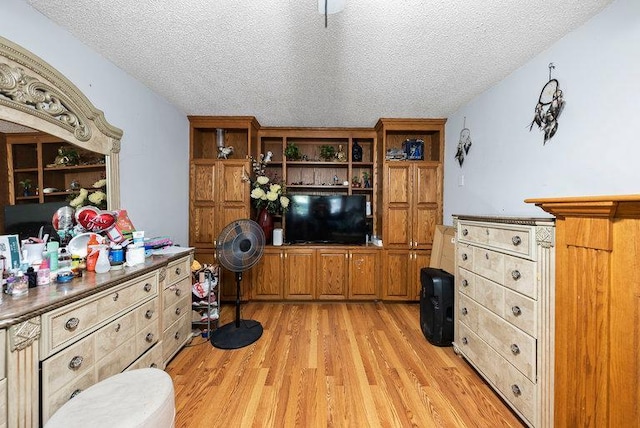 2813 Ohenry Rd, Brooklyn Center, MN 55430 - living room with light wood-type flooring and a textured ceiling