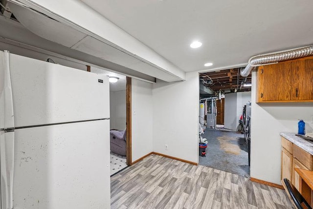 2813 Ohenry Rd, Brooklyn Center, MN 55430 - finished basement featuring freestanding refrigerator, light wood-style flooring, and recessed lighting