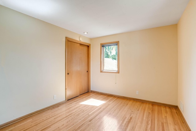 3330 Belden Dr NE, Saint Anthony, MN 55418 - unfurnished room featuring light wood-type flooring and baseboards