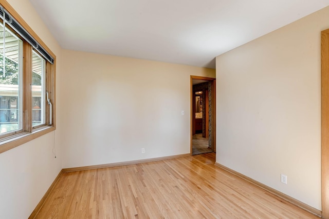 3330 Belden Dr NE, Saint Anthony, MN 55418 - unfurnished room with light wood-style flooring