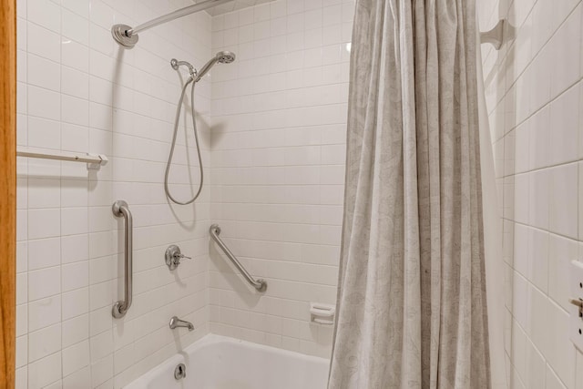 3330 Belden Dr NE, Saint Anthony, MN 55418 - bathroom featuring shower / bathtub combination with curtain