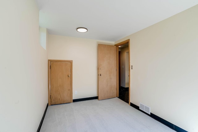 3330 Belden Dr NE, Saint Anthony, MN 55418 - unfurnished room featuring light colored carpet and baseboards