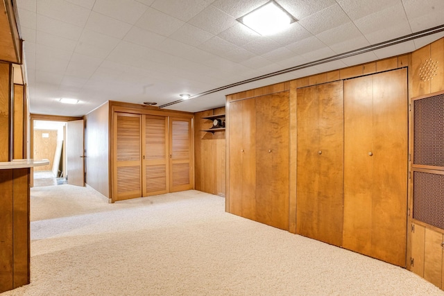 3330 Belden Dr NE, Saint Anthony, MN 55418 - finished basement featuring carpet flooring and wood walls
