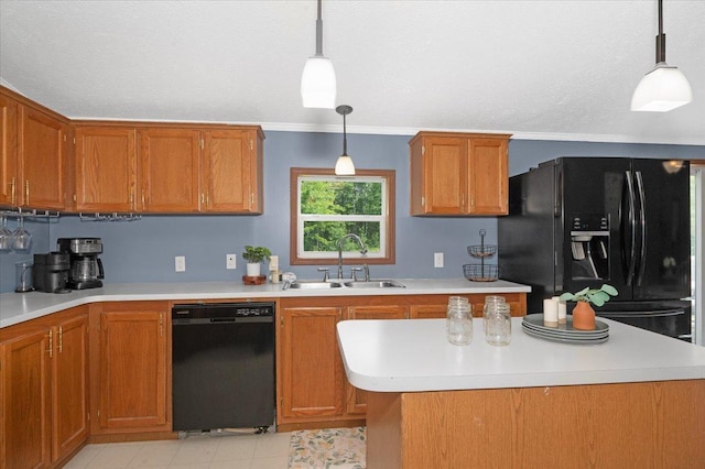 4179 W Tischer Rd, Rice Lake, MN 55803 - kitchen with black appliances, brown cabinetry, light countertops, and pendant lighting