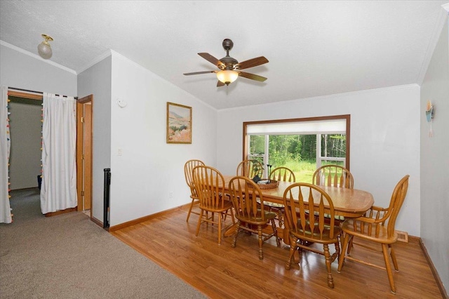 4179 W Tischer Rd, Rice Lake, MN 55803 - dining area featuring crown molding, ceiling fan, and light wood-type flooring