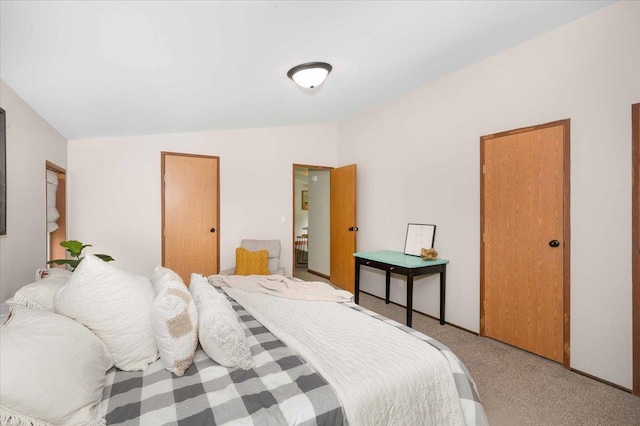 4179 W Tischer Rd, Rice Lake, MN 55803 - bedroom featuring lofted ceiling and carpet