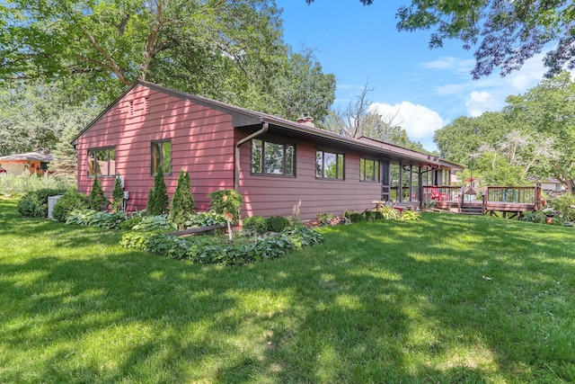 789 Viking Dr E, Little Canada, MN 55117 - view of side of property featuring a lawn and a wooden deck