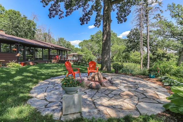 789 Viking Dr E, Little Canada, MN 55117 - view of patio / terrace featuring a fire pit