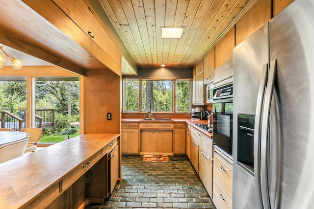 789 Viking Dr E, Little Canada, MN 55117 - kitchen featuring appliances with stainless steel finishes, brick flooring, and wood ceiling