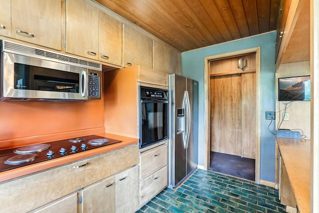 789 Viking Dr E, Little Canada, MN 55117 - kitchen with black appliances, brick patterned floors, wood ceiling, light countertops, and light brown cabinetry