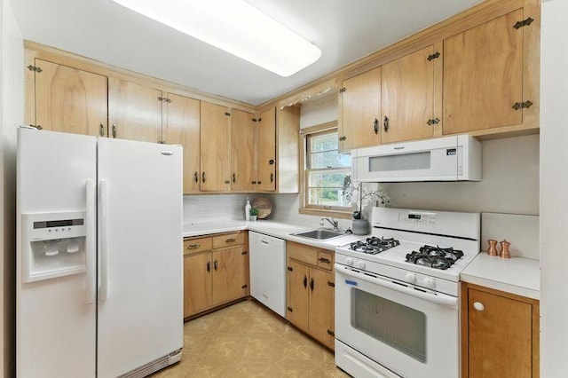7501 Elliot Ave S, Richfield, MN 55423 - kitchen featuring white appliances, light countertops, and backsplash
