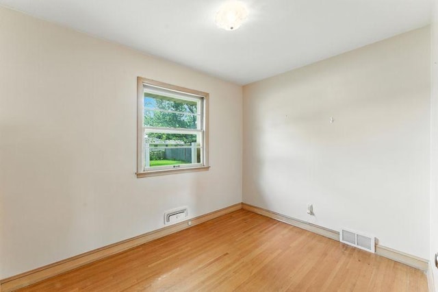 7501 Elliot Ave S, Richfield, MN 55423 - spare room featuring light wood finished floors and baseboards