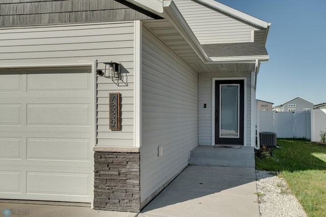 7339 24th St S, Fargo, ND 58104 - doorway to property with a shingled roof
