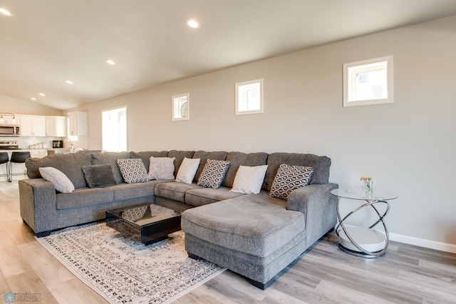 7339 24th St S, Fargo, ND 58104 - living room with light wood finished floors, recessed lighting, and vaulted ceiling