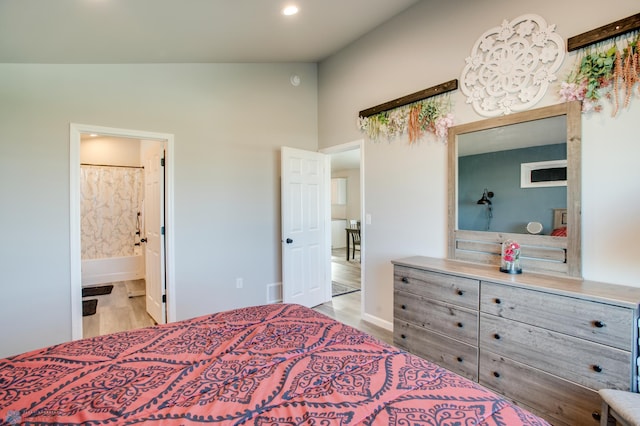 7339 24th St S, Fargo, ND 58104 - bedroom with light wood-style floors, recessed lighting, and ensuite bathroom