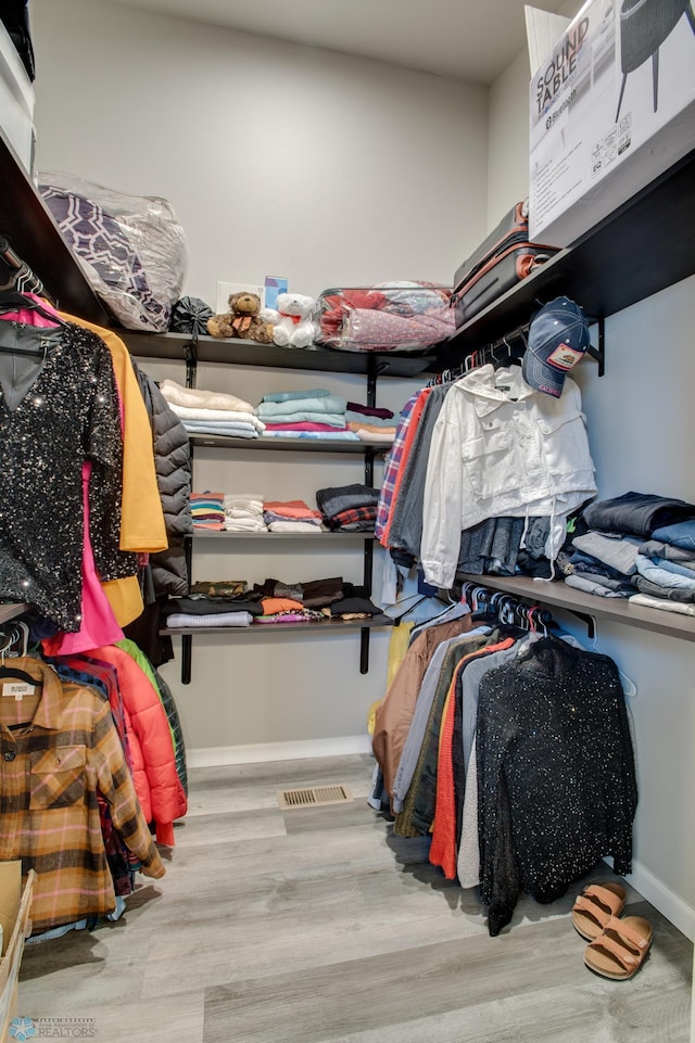 7339 24th St S, Fargo, ND 58104 - spacious closet with wood finished floors