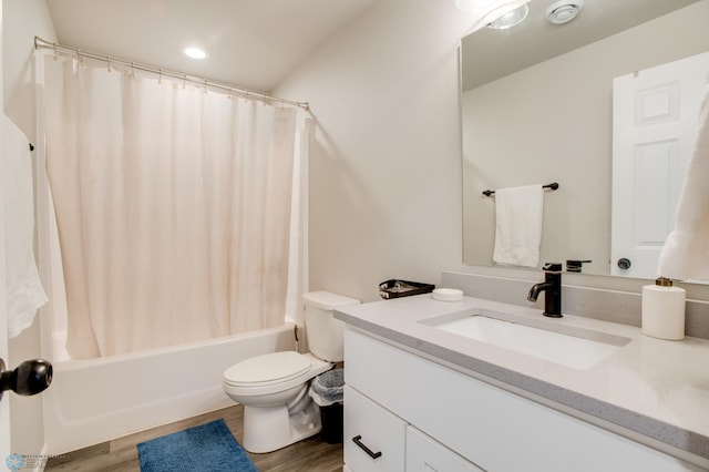 7339 24th St S, Fargo, ND 58104 - bathroom featuring vanity, shower / tub combo with curtain, wood finished floors, and recessed lighting