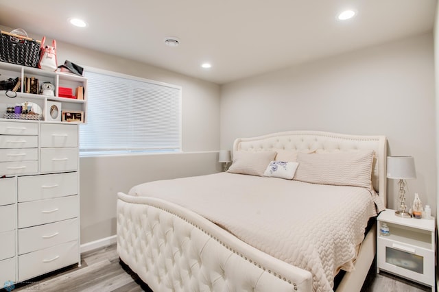 7339 24th St S, Fargo, ND 58104 - bedroom featuring light wood-type flooring and recessed lighting