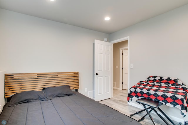 7339 24th St S, Fargo, ND 58104 - bedroom with wood finished floors and recessed lighting