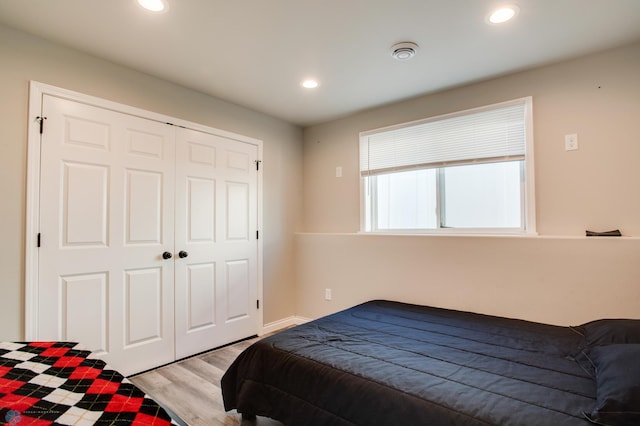 7339 24th St S, Fargo, ND 58104 - bedroom featuring light wood-type flooring, recessed lighting, and a closet