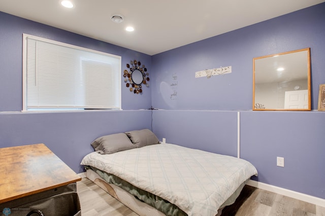 7339 24th St S, Fargo, ND 58104 - bedroom featuring wood finished floors and recessed lighting