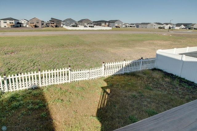 7339 24th St S, Fargo, ND 58104 - fenced yard with a residential view