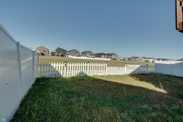 7339 24th St S, Fargo, ND 58104 - fenced backyard with a residential view