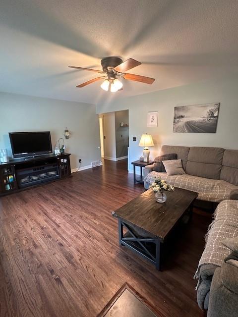 5025 Wilshire Blvd, Crystal, MN 55429 - living area with ceiling fan and wood finished floors